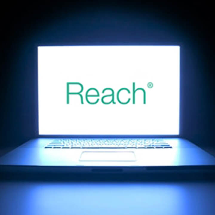 Reach, Walker Morris' free, secure extranet service for clients shown on a laptop