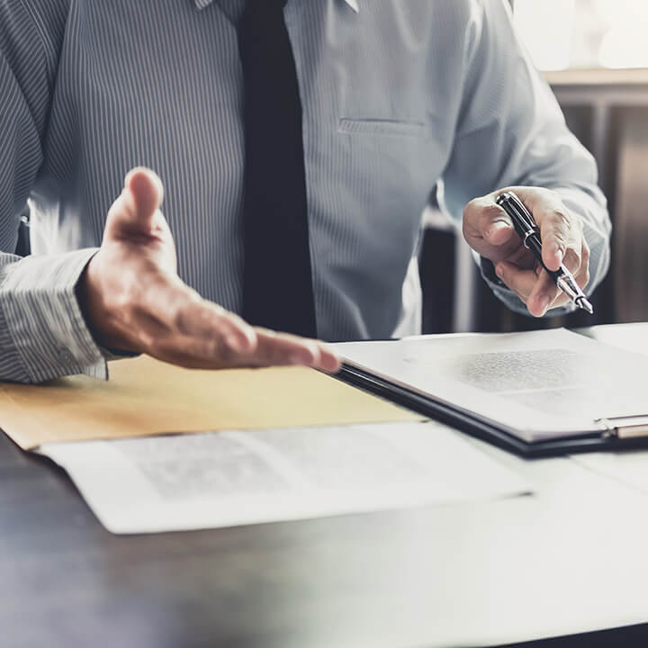 Businessman and Male lawyer having team meeting