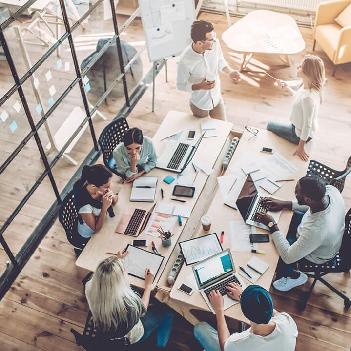 Young people work in modern office.