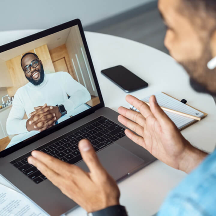 Afro-american-man-talking-using-webcam-internet