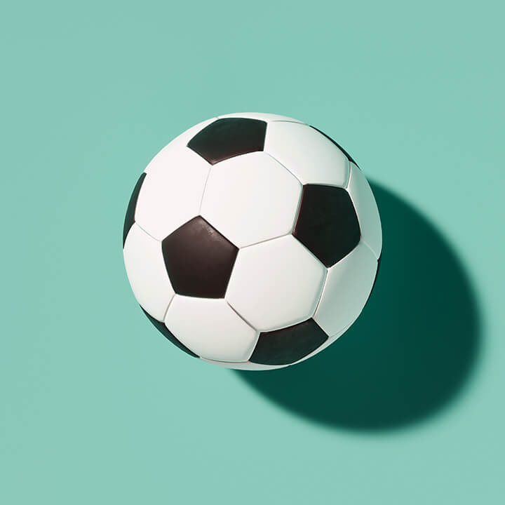 black-and-white-classic-soccer-ball-on-a-green-background